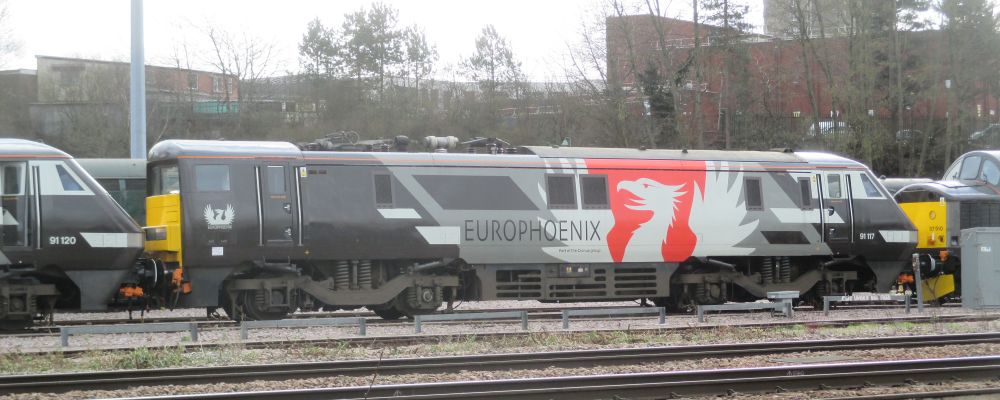 
In EUROPHOENIX livery, Class 91 electric locomotive 91117 (91 117), UK Rail Leasing Yard Leicester (Feb 2020)
