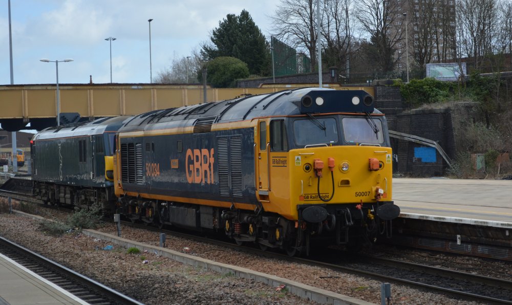 Class 92 electric locomotive hauled SE through Leicester station  by a Class 50 diesel locomotive